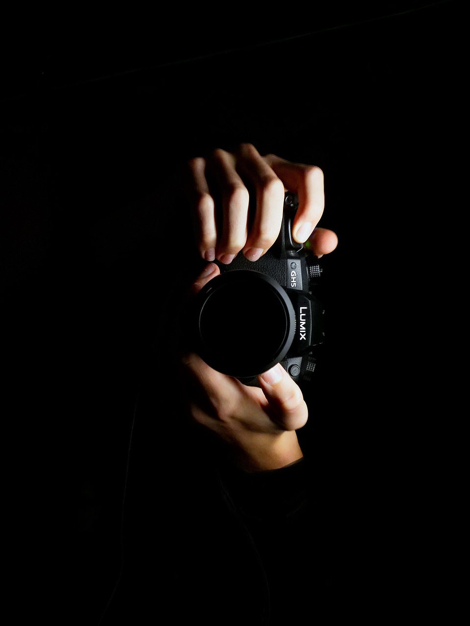 Photographer working on set